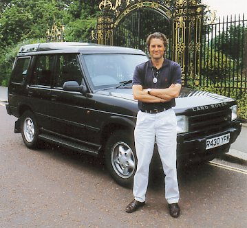 Russell Grant with his air conditioned Land Rover Discovery.  Room for up to 6 passengers.