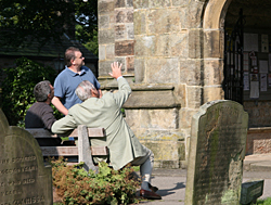 Admiring Hathersage church where his ancestors are buried.